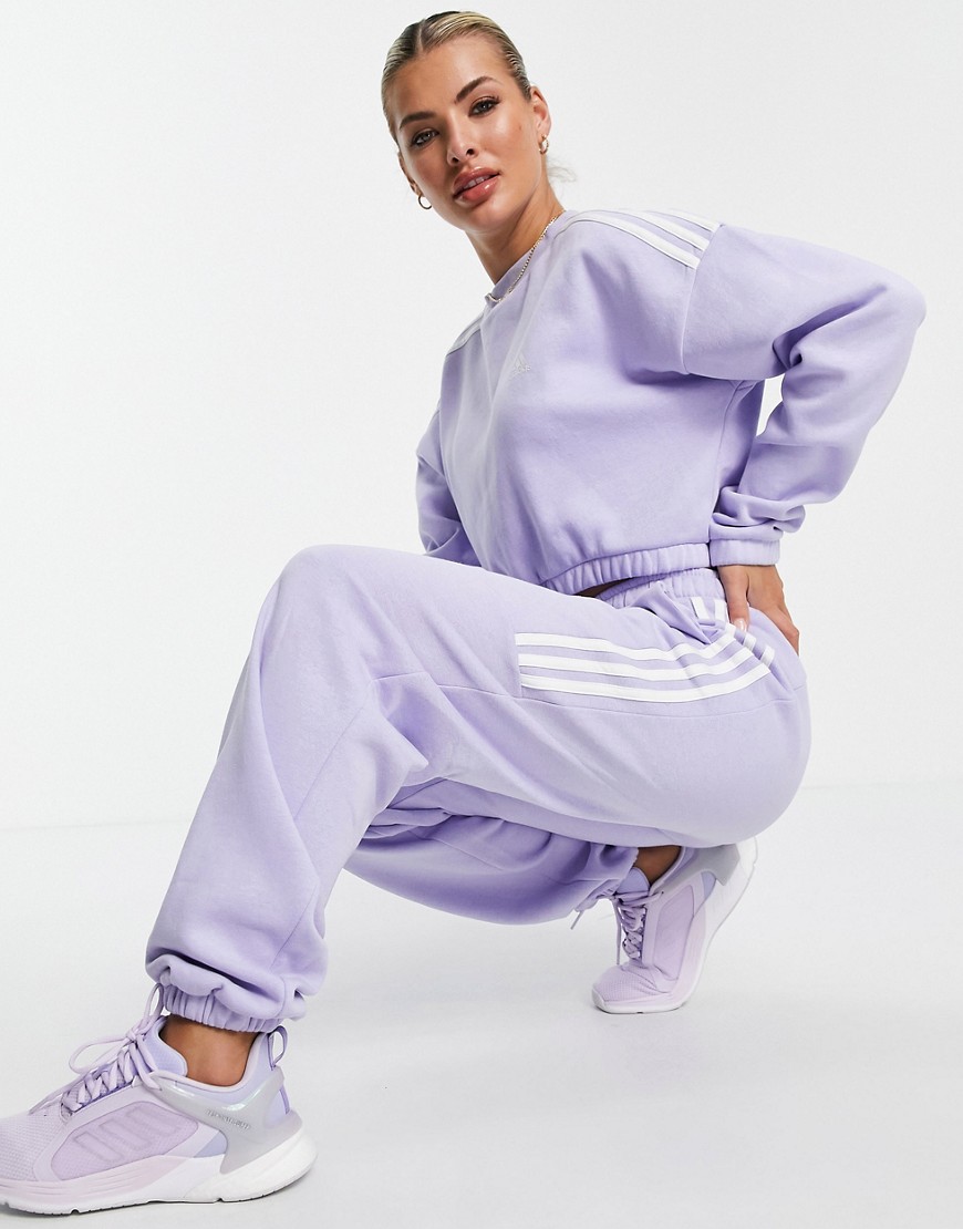 Adidas Training oversized sweatpants with three stripes in lilac-Purple