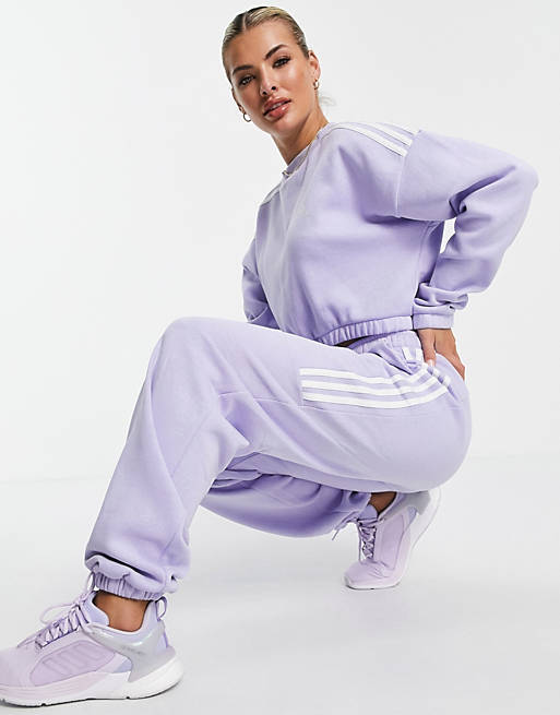 adidas Training oversized sweatpants with three stripes in lilac
