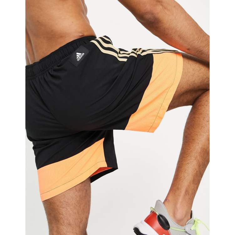 Pantaloncini adidas arancioni fluo outlet
