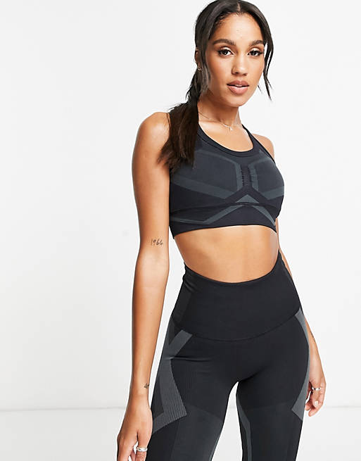 adidas Training Sculpt sports light support sports bra with seam detail in black
