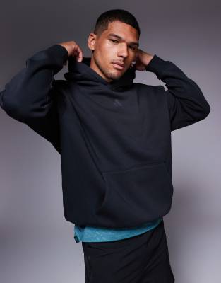 adidas Training Strength oversized hoodie in black - view 1