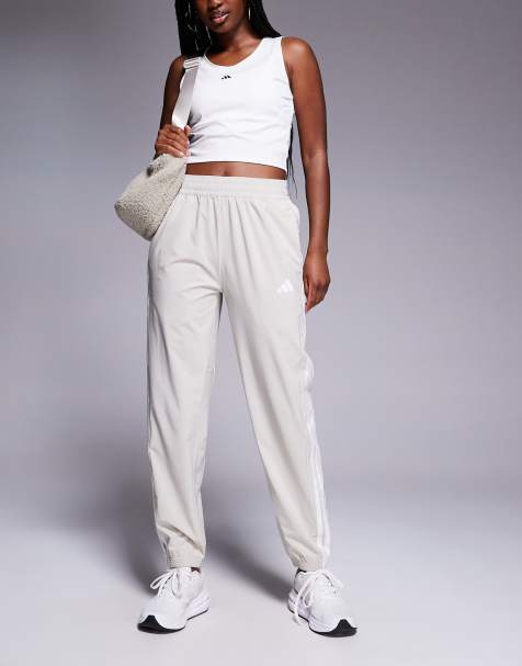 adidas Training 3 stripe woven joggers in stone