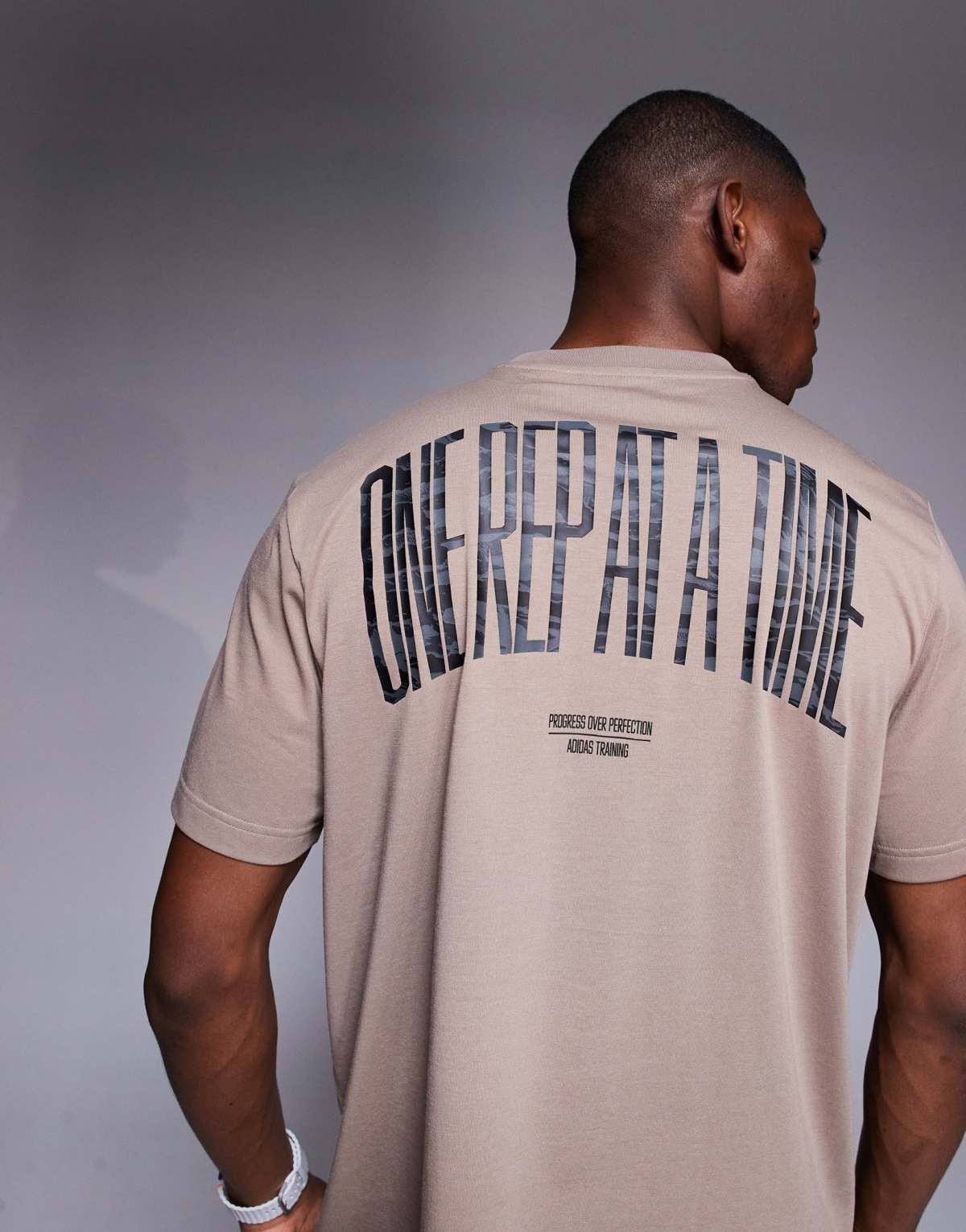 adidas Training t-shirt with graphic print in chalky brown