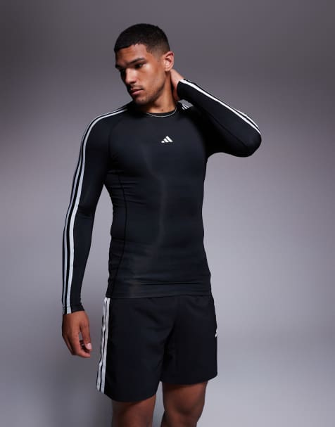 adidas - Training Tech Fit - Top nero a maniche lunghe con 3 strisce - view 1