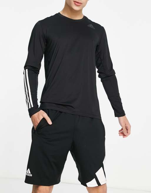 adidas Training Techfit base layer long sleeve top with stripes in black | ASOS