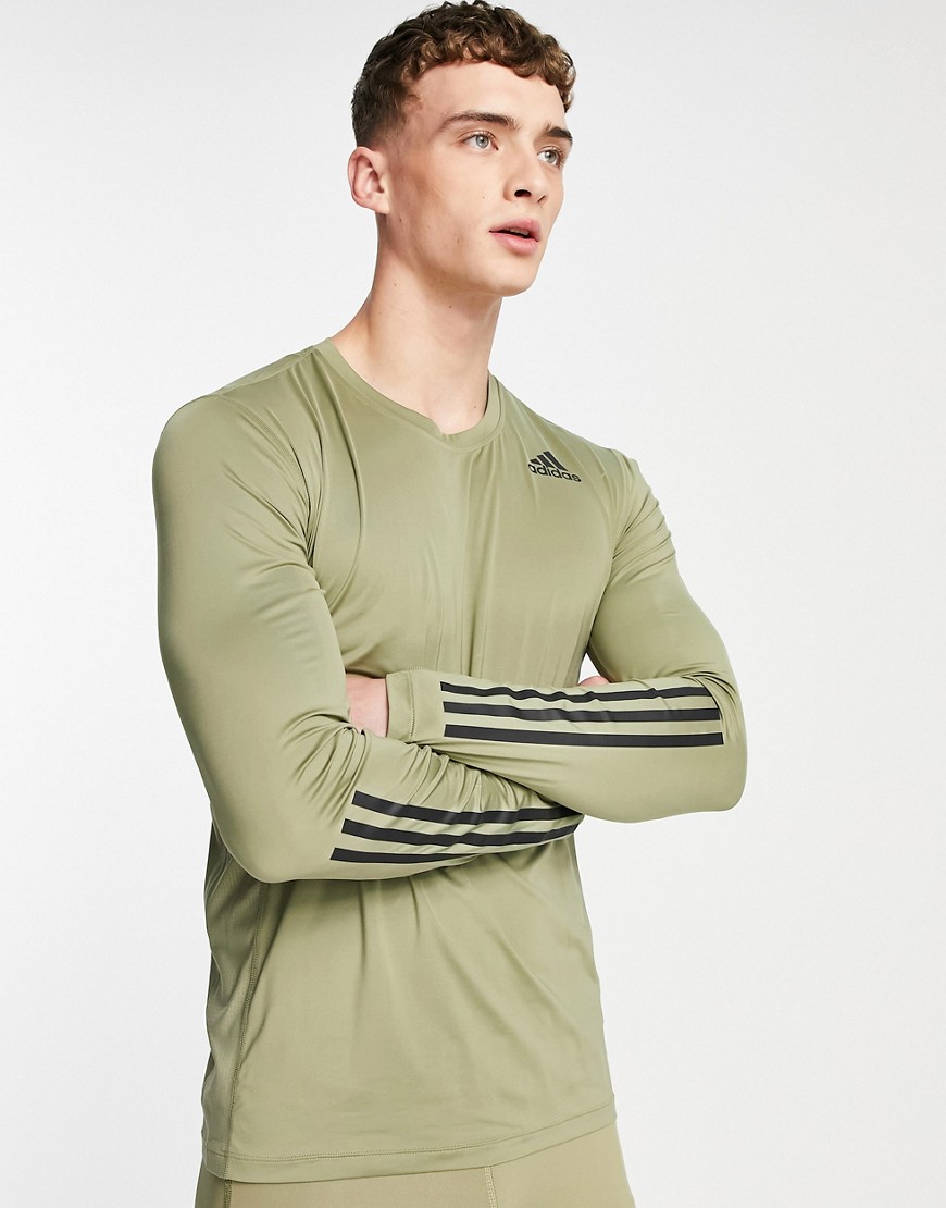 adidas Training Techfit base layer long sleeve top with three stripes in khaki-Green