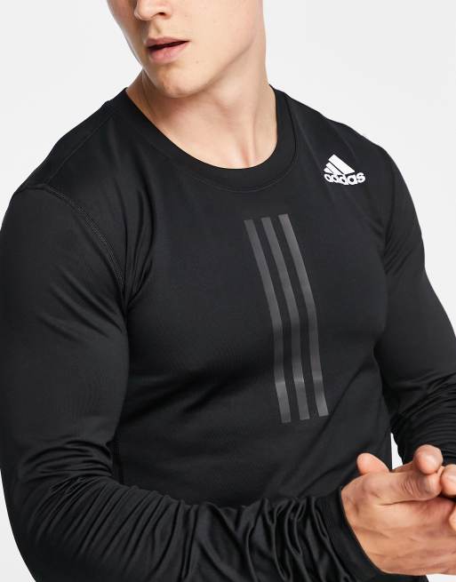 adidas Training base layer long sleeve top with tonal three stripes in black | ASOS