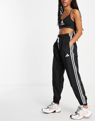 black adidas joggers with black stripes