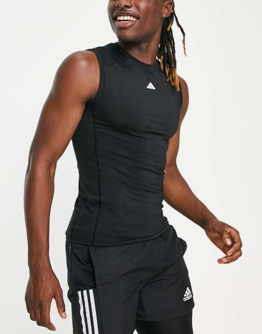 adidas Training tight fit sleeveless t shirt in black