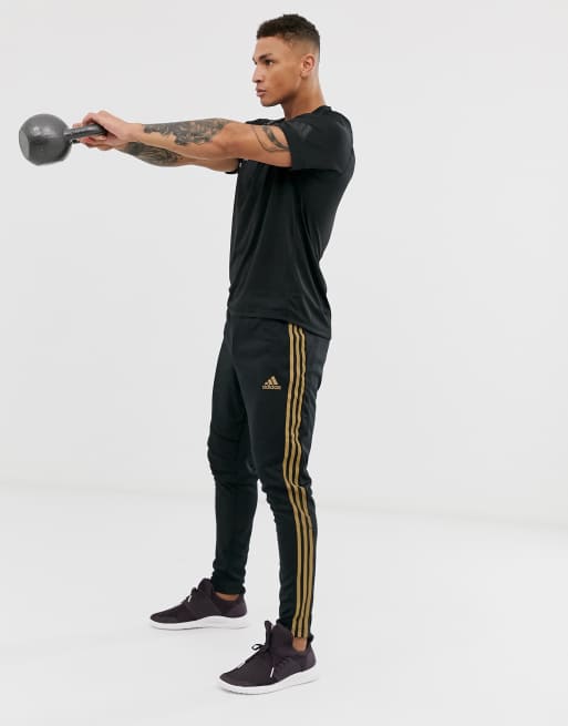 adidas Training Tiro 19 sweatpants in black and gold