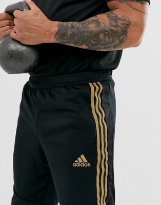 adidas black and gold sweatpants