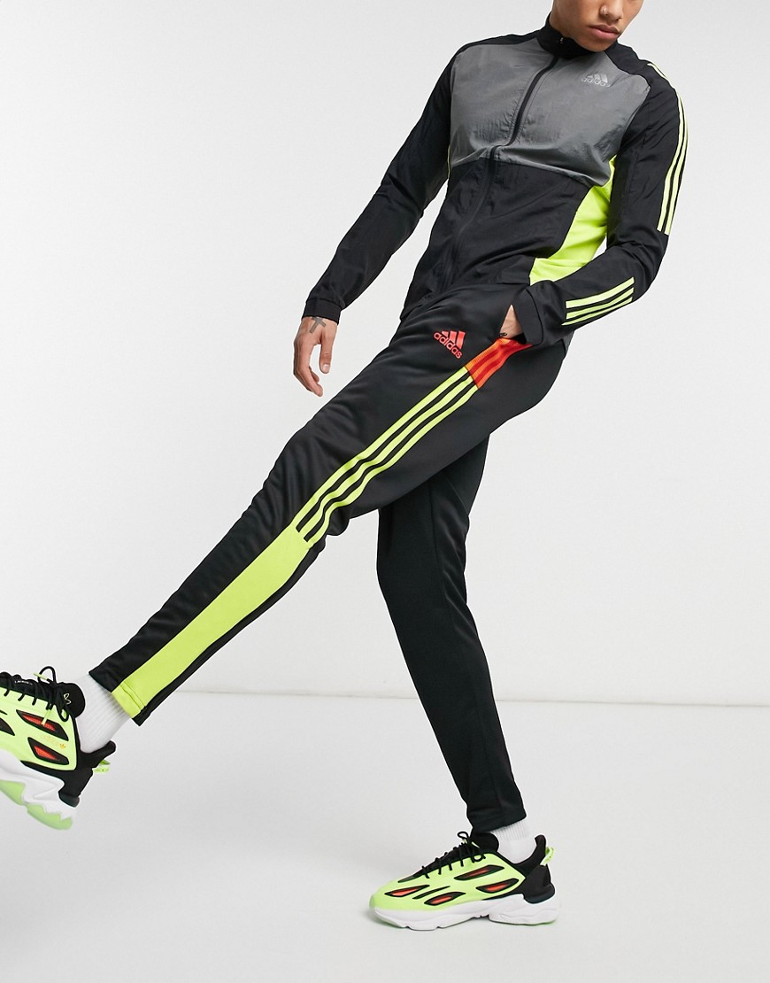Adidas Training Tiro 3 stripe sweatpants in black and yellow