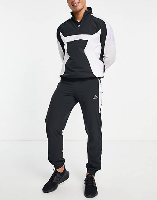 Asos Uomo Sport & Swimwear Abbigliamento sportivo Top sportivi Adidas Training Top della tuta e grigio con zip corta 