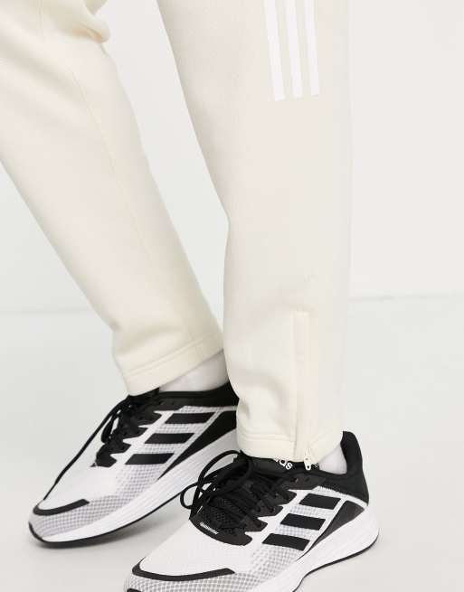 adidas Training trackies with white three stripes in cream, 4 of 4