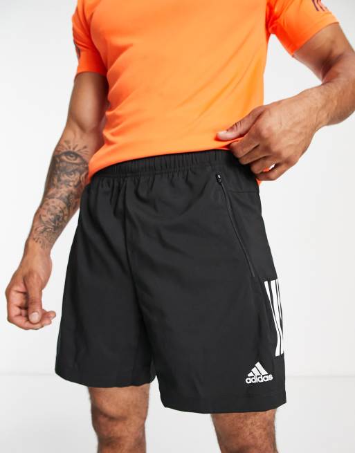 Adidas training shorts store with zip pockets