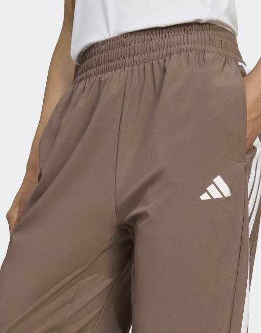 adidas Training Train essentials 3-stripes woven pants in brown / white