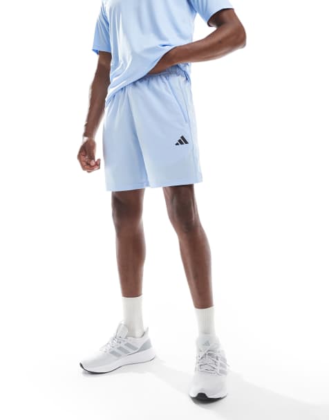 adidas - Training - Train Essentials - Geweven trainingsshorts in glow blue / zwart - view 1