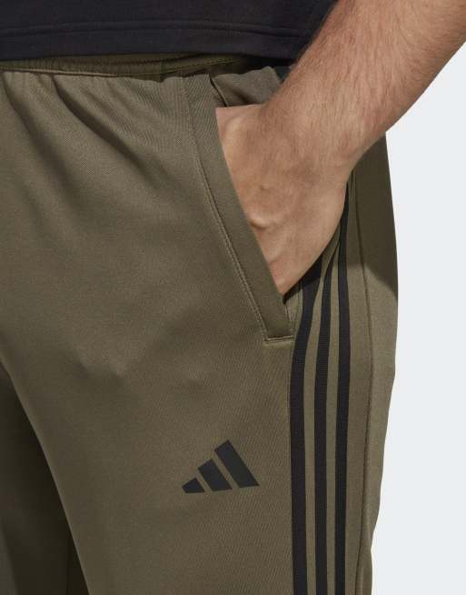 Adidas originals superstar track pants khaki best sale