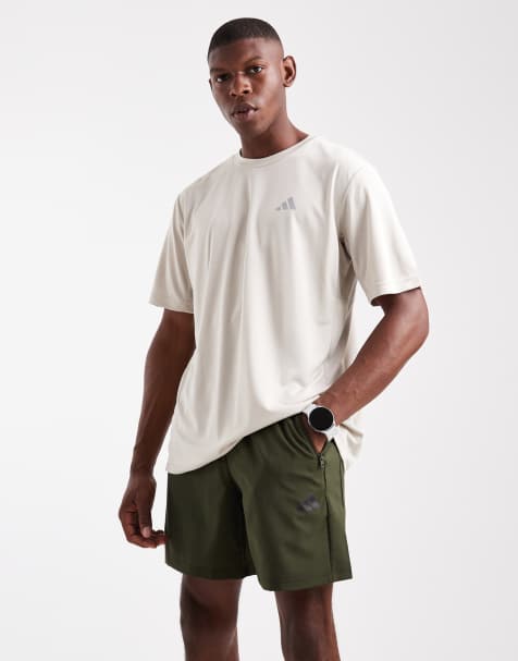 adidas Training Train essentials woven training shorts in night cargo / black - view 1