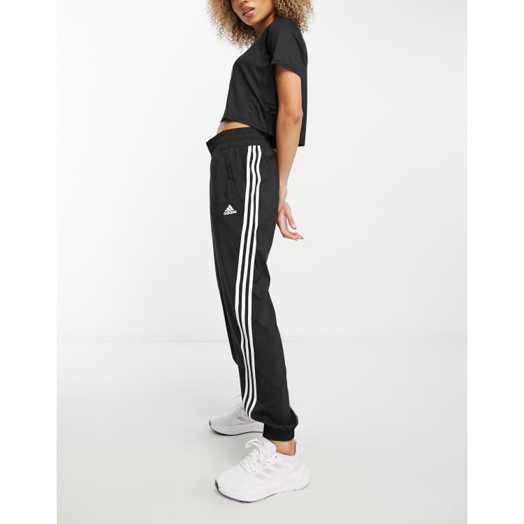 adidas Training Train Icons 3 stripe joggers in black ASOS