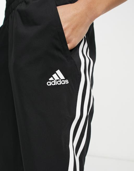 adidas Training Train Icons 3 stripe sweatpants in black