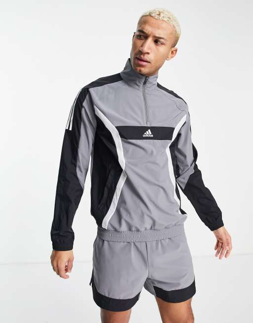 adidas – Training – Trainingsjacke in Grau mit kurzem Reißverschluss
