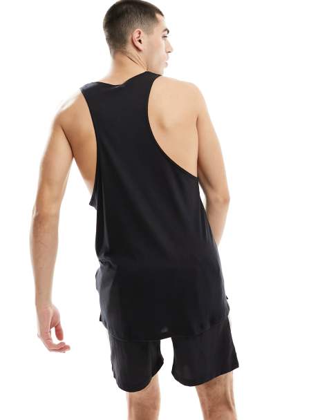 adidas Training tight fit sleeveless t-shirt in black