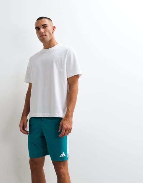 adidas trænings-essentials swimshorts med 3 striber i turkis - view 1