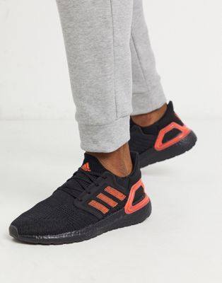 Adidas Ultraboost 20 trainers in black with red detail