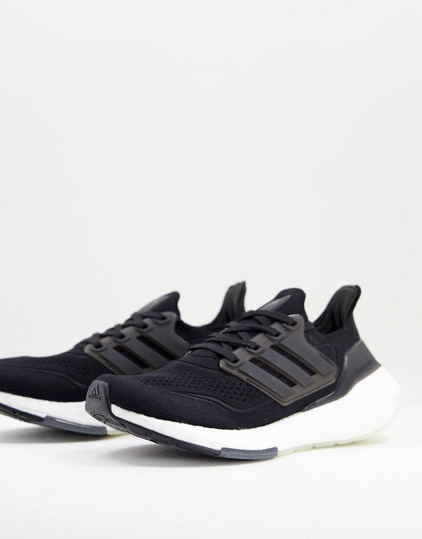Adidas Ultraboost 21 sneakers in black and white