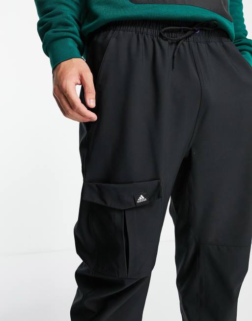 adidas Sportswear utility joggers with front pocket in black