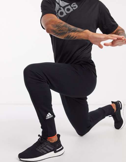 adidas VRCT pants in black semi solar red