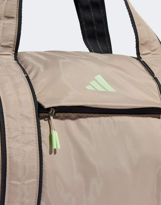 https://images.asos-media.com/products/adidas-yoga-duffel-bag-in-beige/205734028-3?$n_640w$&wid=513&fit=constrain