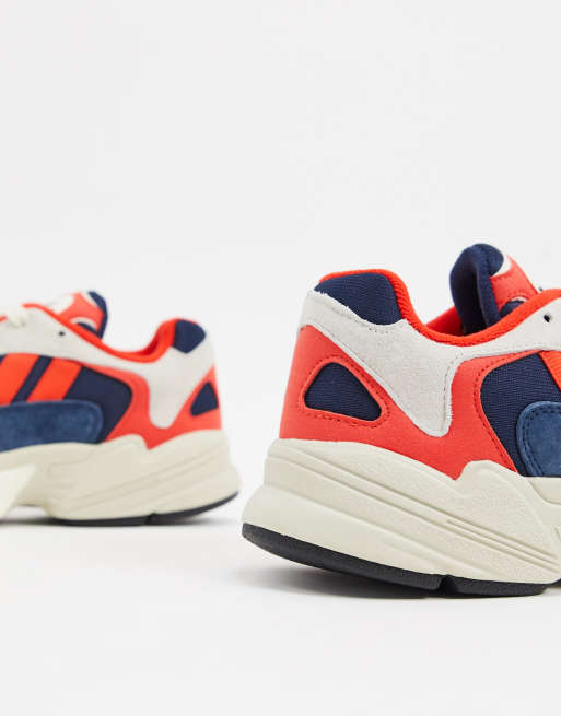 Adidas originals yung-1 sneakers shop in white and orange