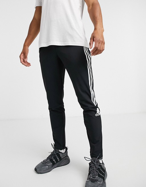 adidas ZNE 3 stripe joggers in black | ASOS