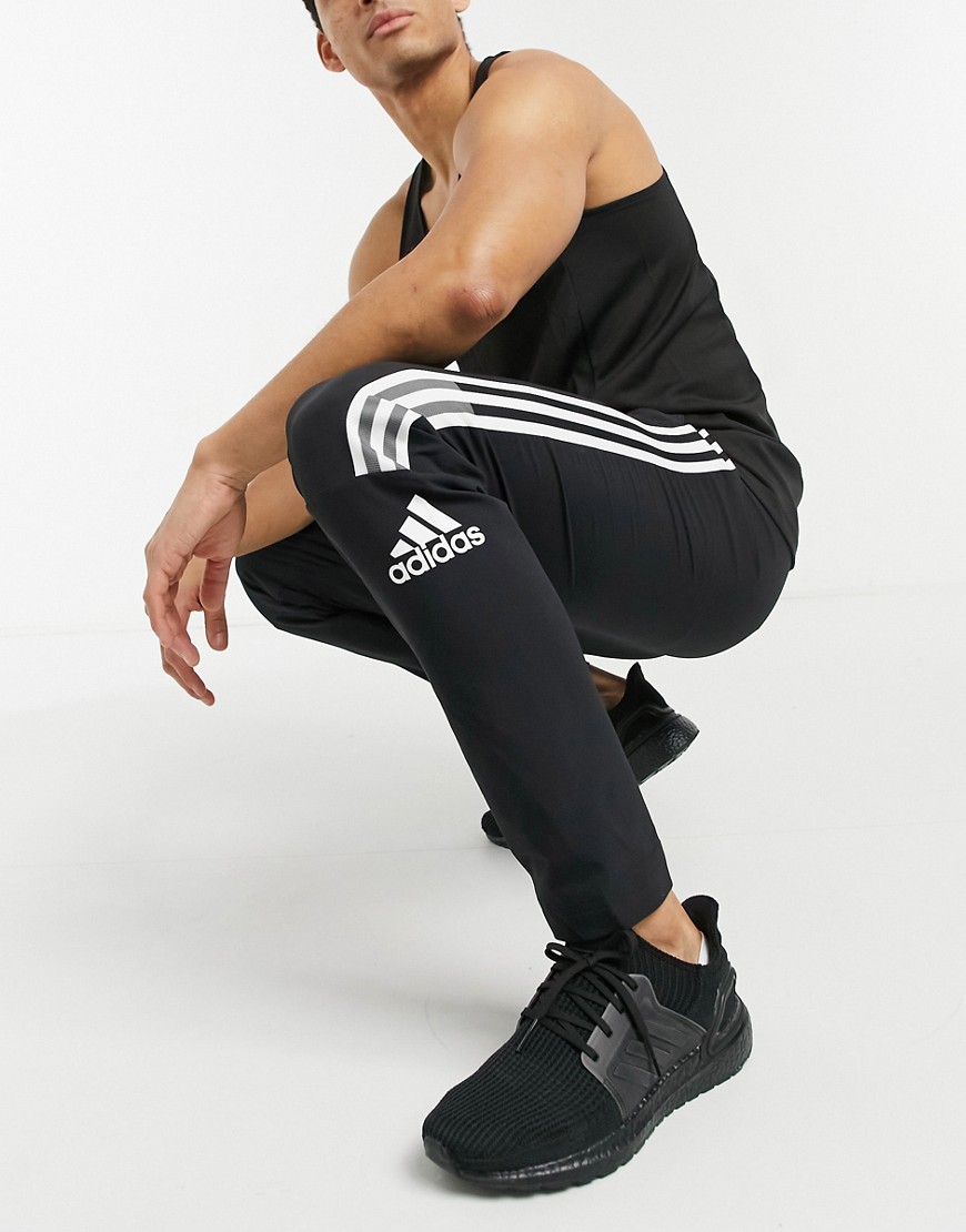 Adidas ZNE 3 stripe sweatpants in black
