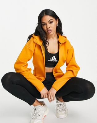 adidas ZNE sportswear hoodie in orange - ASOS Price Checker