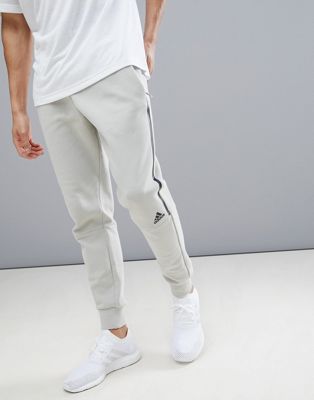 Adidas ZNE striker pants in beige 