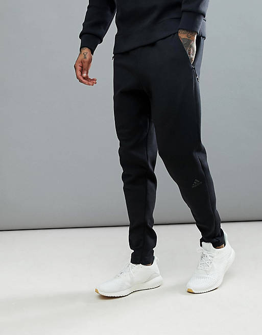 Adidas ZNE striker sweatpants in black bq7042 | ASOS
