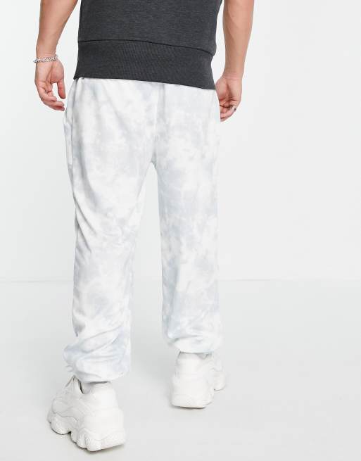 Adolescent Clothing – Lounge-Jogginghose in Oversize-Passform mit „Slow Down“-Schriftzug und Batikmuster, 2 von 4
