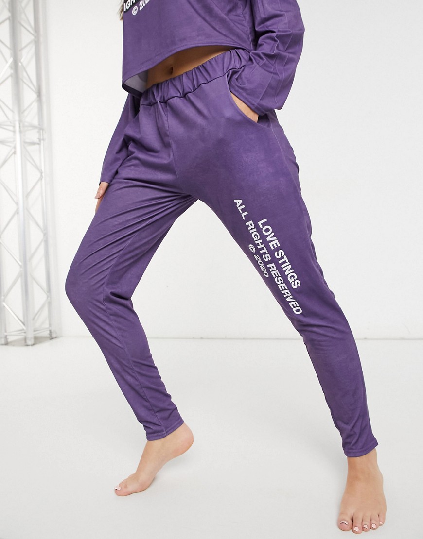 Adolescent Clothing love stings lounge trousers in purple