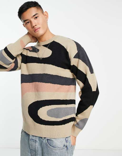 ADPT – Beżowy sweter oversize z dzianiny w abstrakcyjny żakardowy wzór 