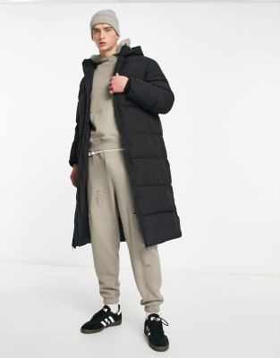 ADPT long line puffer jacket in black