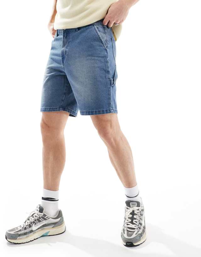 ADPT - loose fit denim cargo shorts in mid wash