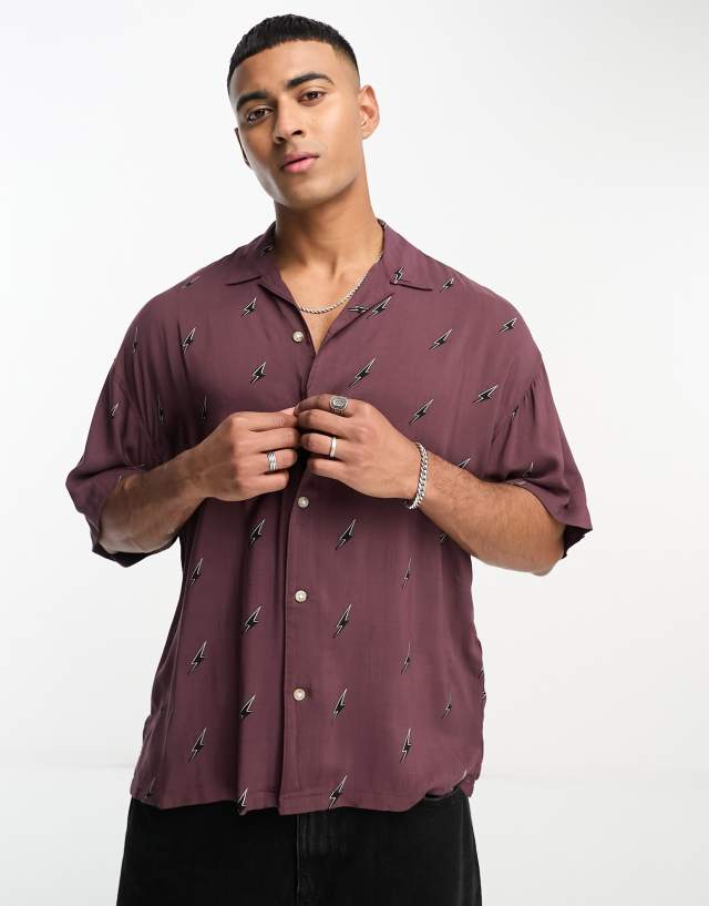 ADPT oversized revere collar short sleeve shirt with lightning print in burgundy