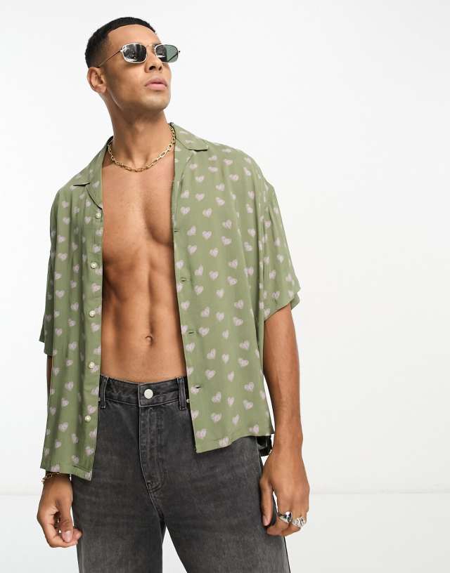 Adpt oversized revere collar short sleeve shirt with scribbled hearts print in khaki