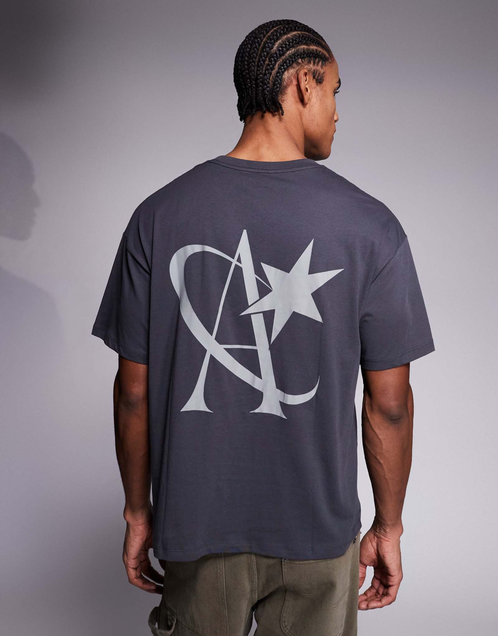 Футболка ADPT оверсайз черного цвета с принтом в виде звезд сзади и спереди