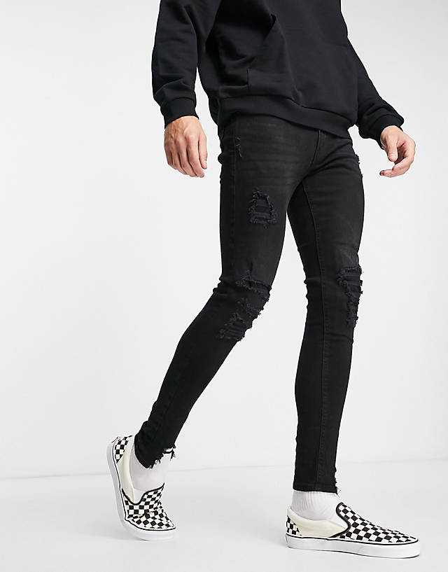 ADPT - spray on skinny jean with heavy rips in washed black