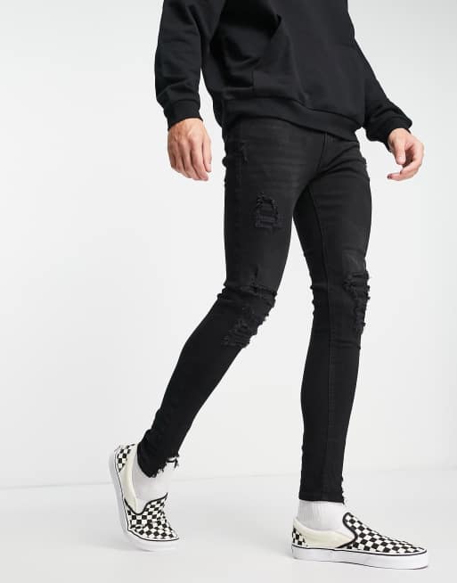 ADPT spray on skinny jean with heavy rips in washed black 