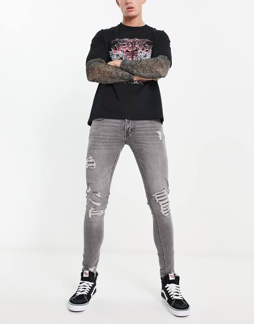 ADPT spray on skinny jeans with heavy rips in grey wash